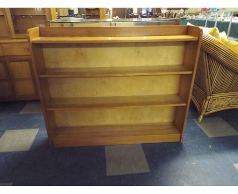 A Three Shelf Open Bookcase.