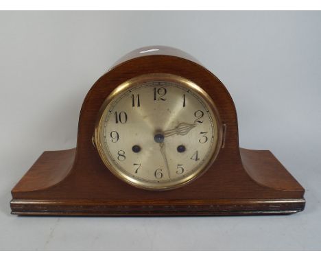 An Oak Mantle Clock. 