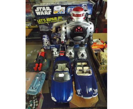 A Collection of Die Cast Toys Spectrum Vehicles and Figures Star Wars R2-D2 Etc. 