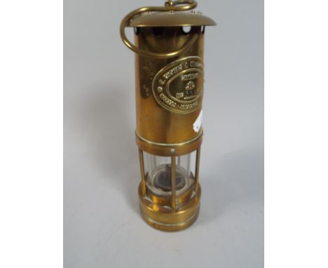 A Brass Miners Lamp, E Thomas and Williams.