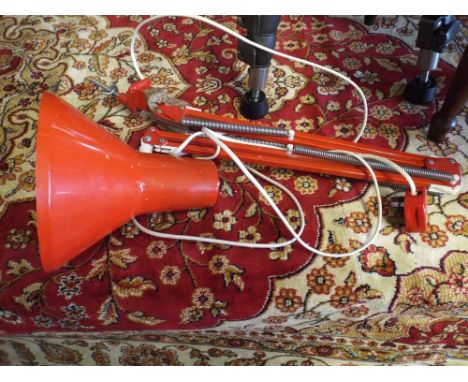 An Angle Poise Lamp.
