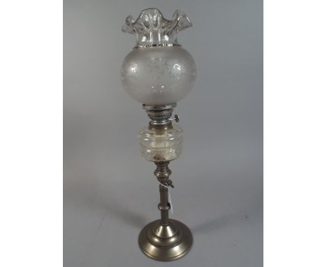 A Rise and Fall Oil Lamp with Etched Shade. 