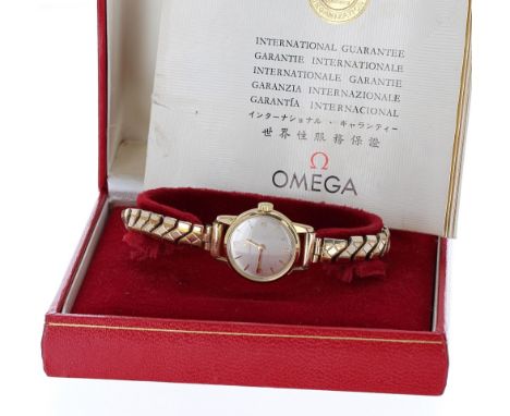 Omega 9ct lady's bracelet watch, ref. KD5110015, circa 1966, no. 2xxxxx50, silvered dial with Arabic quarter numerals and bat