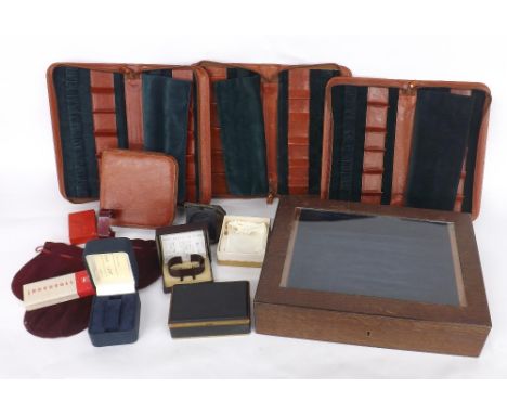 Five tan leather watch cases; together with a wooden display case with blue lined interior and glazed hinged lid, also a smal