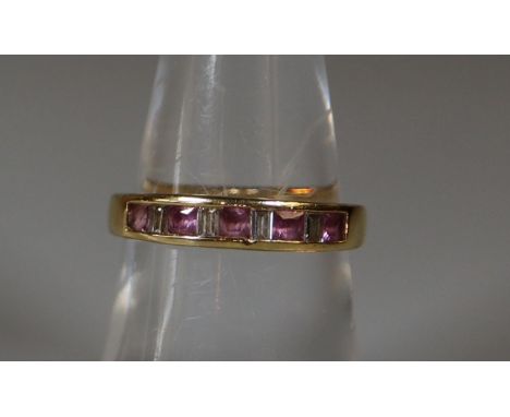 18ct gold pink sapphire and diamond half eternity style ring.  Ring size N.  Approx weight 3.4g.(B.P. 21% + VAT) 