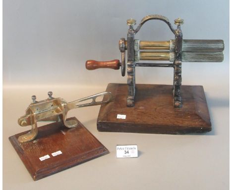 E & T Clark's Warranted crimping machine on oak base, together with a vintage brass single handled, hand held slicing machine