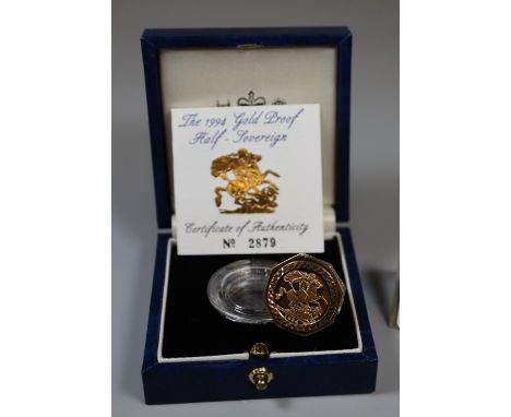 A Queen Elizabeth II 1994 gold half sovereign set in a 9ct gold ring mount.  Ring size R.  Approx weight 10 grams.  (B.P. 21%