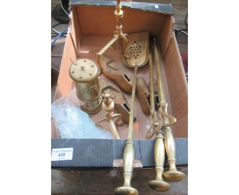 Set of three brass fire irons, a pair of andirons, a brass miner's safety lamp and three cast iron shoe lasts. (B.P. 21% + VA
