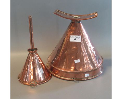 Two vintage copper conical funnels of varying size. (2)(B.P. 21% + VAT) 