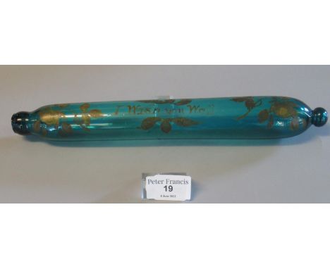 19th Century coloured glass decorative rolling pin with painted floral decoration and text 'I wish you well', 35cm long appro