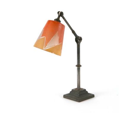 An early 20th century steel adjustable desk lamp, 43cms high.Condition ReportBase is cast iron, no damage to shade, good cond