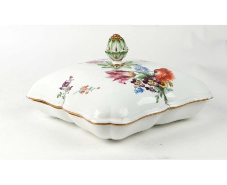 A Meissen tureen and cover of compressed square form, decorated with flowers  and having an artichoke finial, 27cms wide.Cond