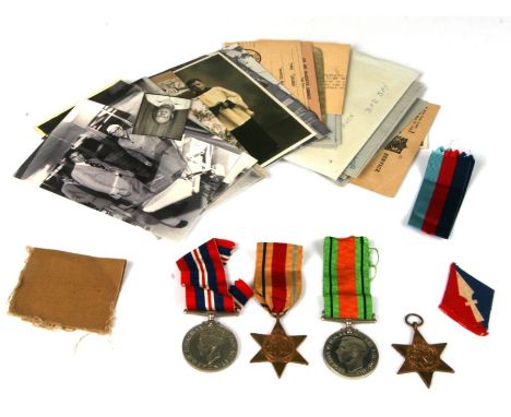 A WW2 Medal group, letters, photographs and personal Military documents relating to 14284985 Gunner BL Wood of 103 H.A.A. Reg