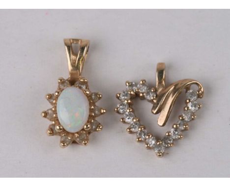 A 14ct gold, opal and diamond pendant; together with a 14ct gold diamond heart shaped pendant (2).