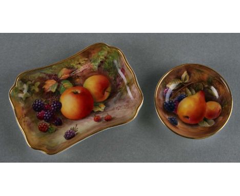 A Royal Worcester pin dish of shaped rectangular form, decorated with fruit and berries, signed 'T Lockyer', 11cms diameter; 