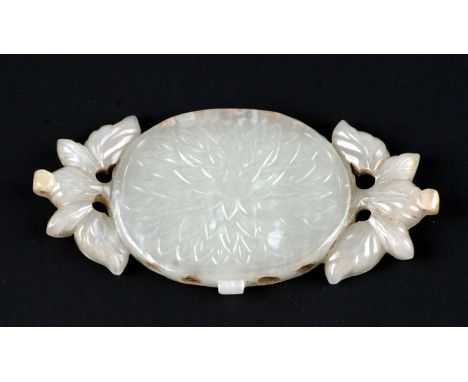 A Chinese jade pendant in the form of flowers and foliage,7cms long.Condition ReportGood condition