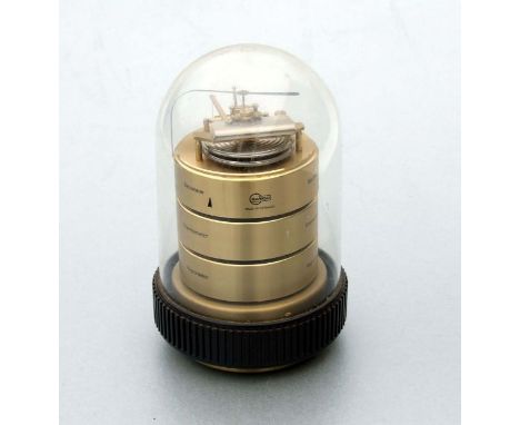 A German Barigo three-drum weather station with scales for barometer, thermometer and hydrometer, under a Perspex dome, 16cms