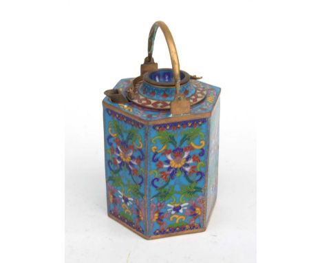 A Chinese cloisonne teapot of hexagonal form decorated with scrolling flowers on a turquoise ground, 11cms high; together wit