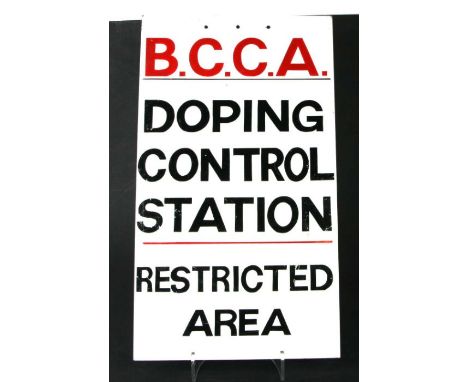 A painted enamel sign 'B. C. C. A. Doping Control Station, Restricted Area', 30 by 54cms.