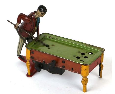 An early 20th century Gunthermann of Germany tin plate clockwork bar billiards table, 15cms wide.