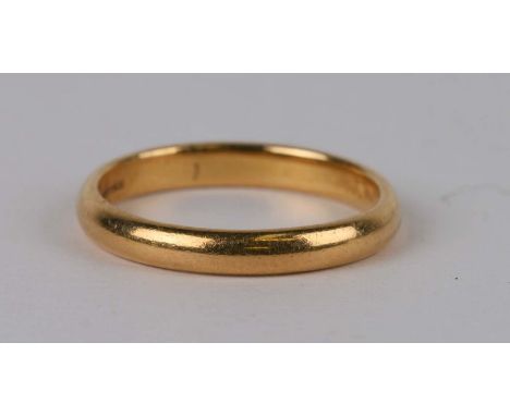 A 22ct gold wedding band, approx UK size 'R', 4.9g.