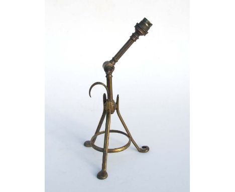 An early 20th century WAS Benson style brass adjustable Pullman lamp, 36cms high.