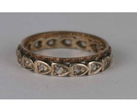 A 9ct gold and diamond eternity ring, weight 3.5g, approx UK size 'R'.Condition ReportAll stones present and full English hal