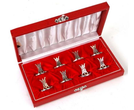 A set of eight Chinese Hong Kong silver menu holders in a red case, 212g.Condition Reportgood overall condition some light su