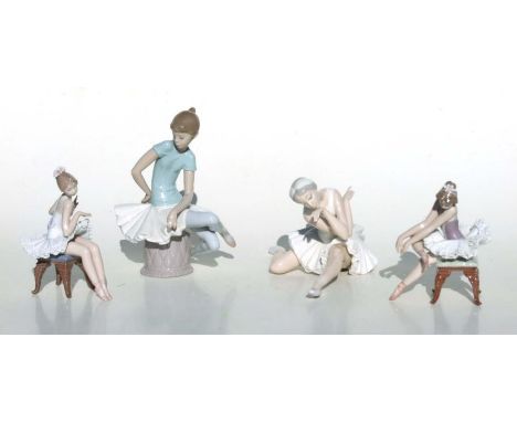 A group of Lladro ballerina figures, the largest 21cms high (4).Condition Reportlarge seated figure is missing a thumb all ot