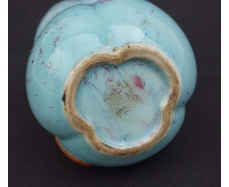 A Chinese robin egg glaze joss stick holder in the form of a tied sack, 9.5cms high.Condition Reportgood overall condition wi