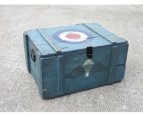 A military painted pine trunk with later painted RAF roundel and Parachute Regiment insignia, 69cms wide.