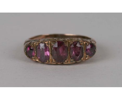 A 9ct gold and five-stone amethyst half hoop ring, weight 2g, approx UK size 'K'.