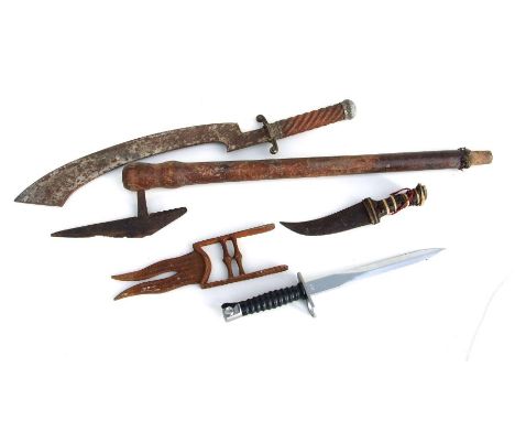 Five assorted weapons to include a tribal axe, an Indian Katar and a bayonet, the largest 78cms long (5).Condition ReportKata