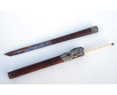 A late 19th century Chinese metal mounted hardwood trousse eating set comprising a knife, blade length 15cms and an ivory cho