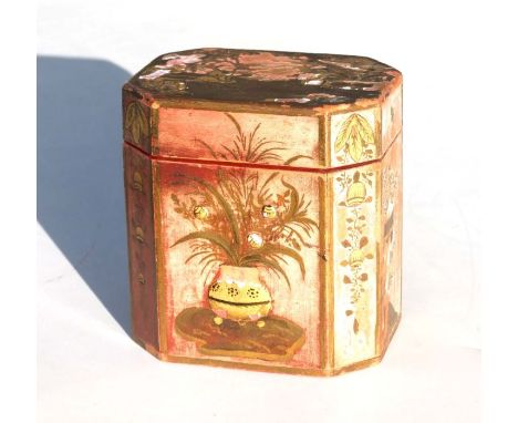 A chinoiserie lacquer tea caddy of octagonal form, 12cms wide.