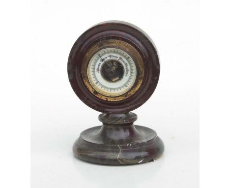 A Cornish serpentine desktop barometer, 14cms high.