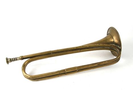 A WWI Boosey &amp; Co. brass military bugle, stamped 1916, 42cms long.