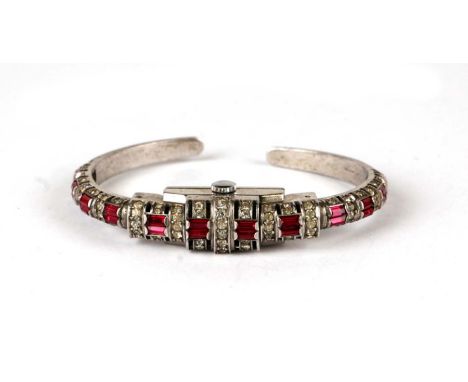A Jean Perret Geneve cocktail watch on paste set bangle strap.Condition ReportManual 17 jewel movement which ticks when wound