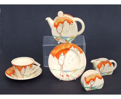 A Clarice Cliff Orange Taormina pattern Bonjour shape tea for one set, comprising teapot, milk jug and sugar bowl, cup, sauce