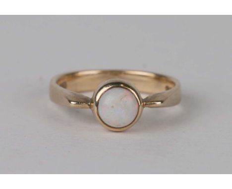 A 9ct gold and solitaire cabochon opal ring, 2.6g, approx UK size 'M'.