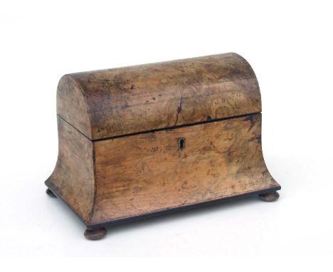 A Victorian walnut tea caddy with concave sides and domed top, on bun feet, 25cms wide.Condition ReportSome sun fading, one b