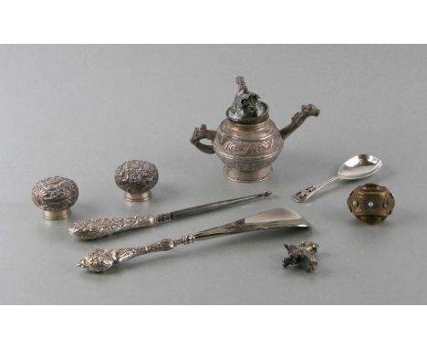 A Chinese silver coloured metal miniature teapot, 8cms high; together with two silver scent bottle tops; and other silver and