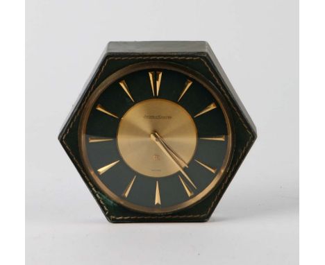 A Jaeger LeCoultre Hermes leather desk clock, 14cms wide.Condition ReportCurrently not running and the leather case has some 