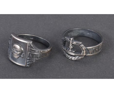 Two WWII Second World War Third Reich Nazi German Officers rings comprising a Kriegsmarine ' We Drive Towards England ' ring 