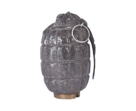 An original WWI First World War British Army inert No. 5 MKI mills bomb / hand grenade. Typical form with pin and firing leve