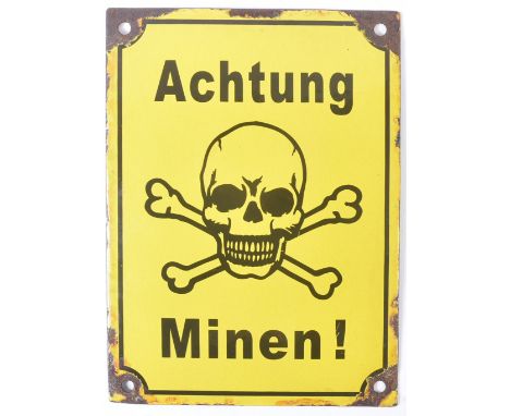 A WWII Second World War Third Reich Nazi German enamel sign. Yellow with a black ' Achtung Minen! ' and a central skull. Meas