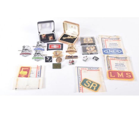 A collection of assorted British Railways badges, pins and cloth patches to include; LNER, Southern, Caledonian and Great Cen