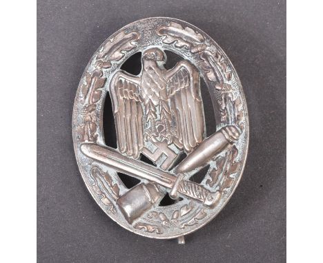 A WWII Second World War Third Reich Nazi German General Assault badge. The badge being a solid back example with oak leaf bor