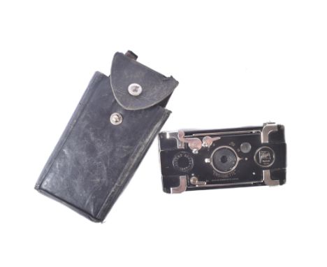 A WWI First World War British Army Officers compact folding camera.&nbsp;Black painted brass body, leather unpleated bellows 