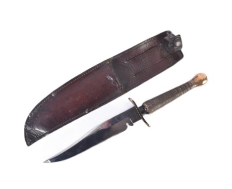 A WWII Second World War c1940 FS Fairbairn Sykes 1st pattern commando fighting knife / dagger. Chequered grip, with slightly 